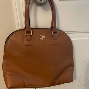 Great Tory dome bag. Inside has stain but outside looks great.